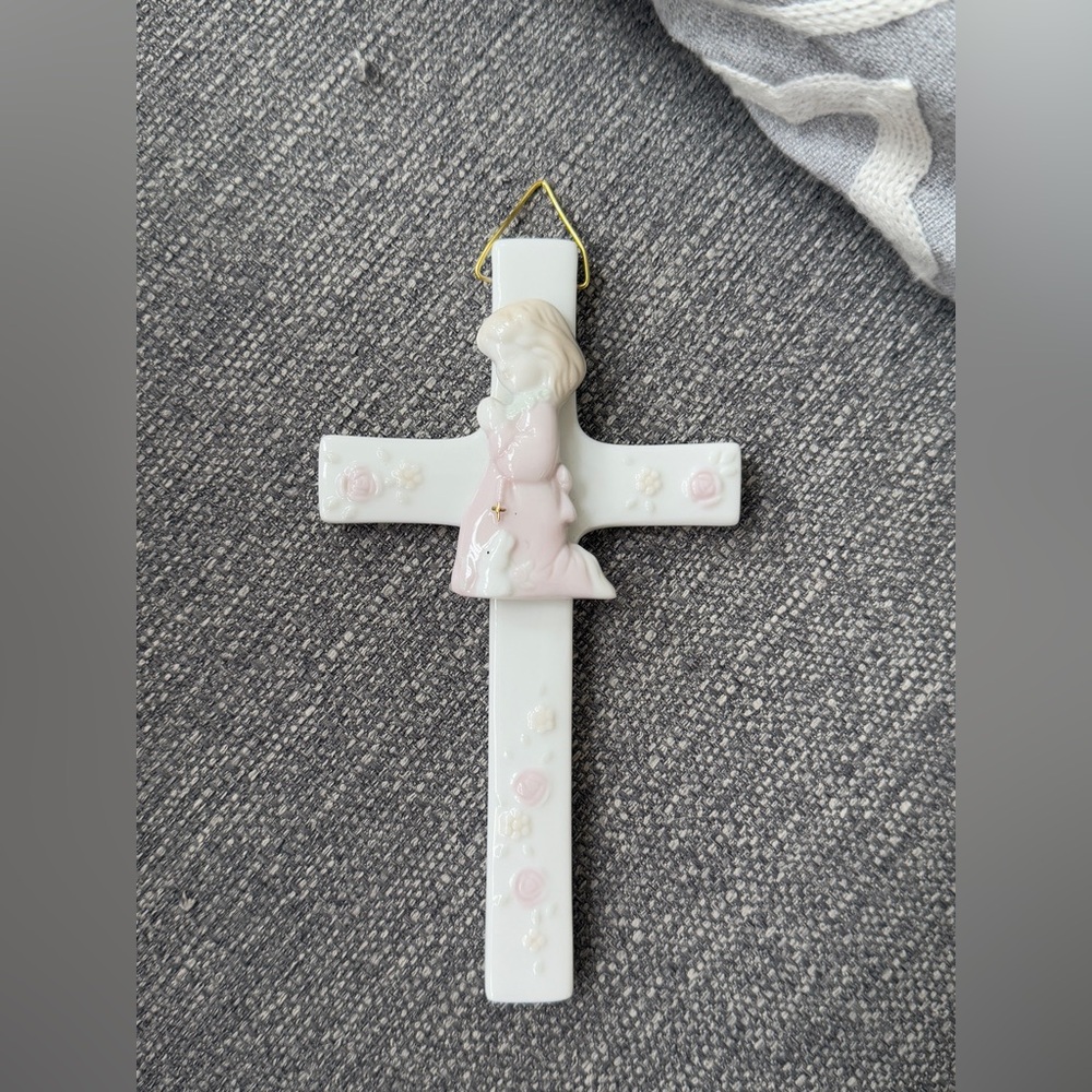 Little girl and lamb cross